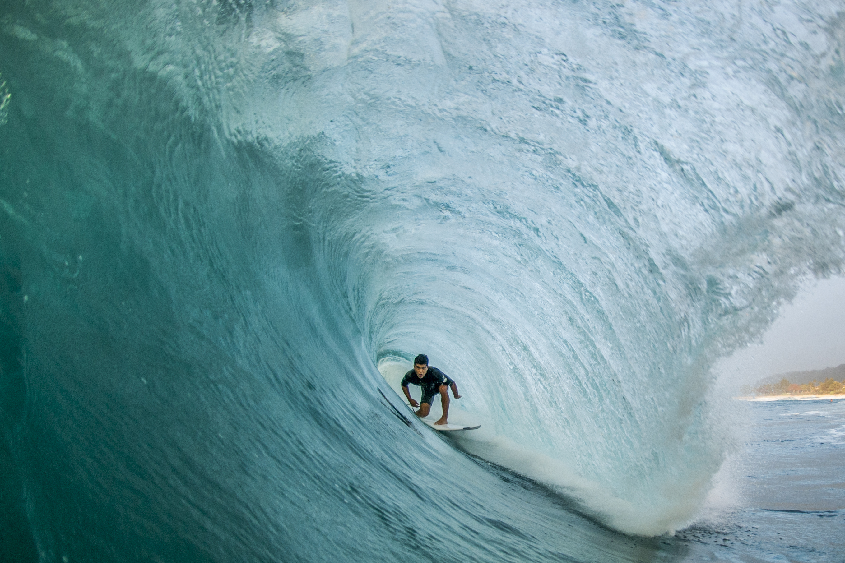 A surfer riding the waves.