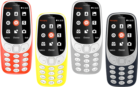 Four Nokia 3310 phones in four distinct colors.