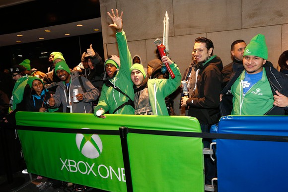 People celebrating the Xbox One launch