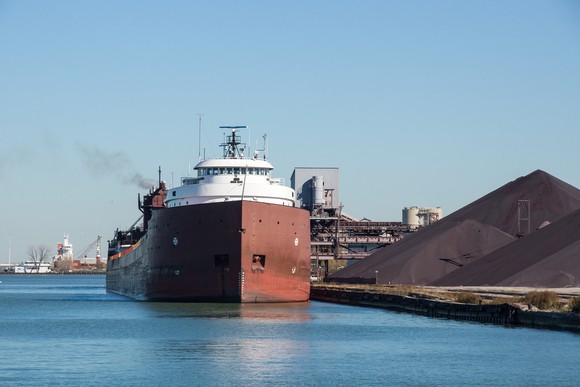 Dry bulk cargo ship unloading.