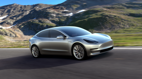 Model 3 driving on a mountain road