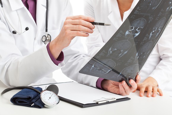 Doctors examine an X-ray.