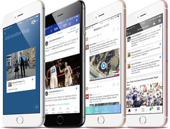 Four smartphones with Twitter apps running.