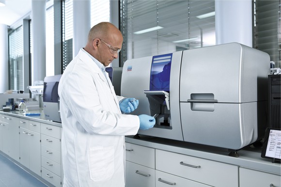 A Qiagen scientist uses an oncology system.