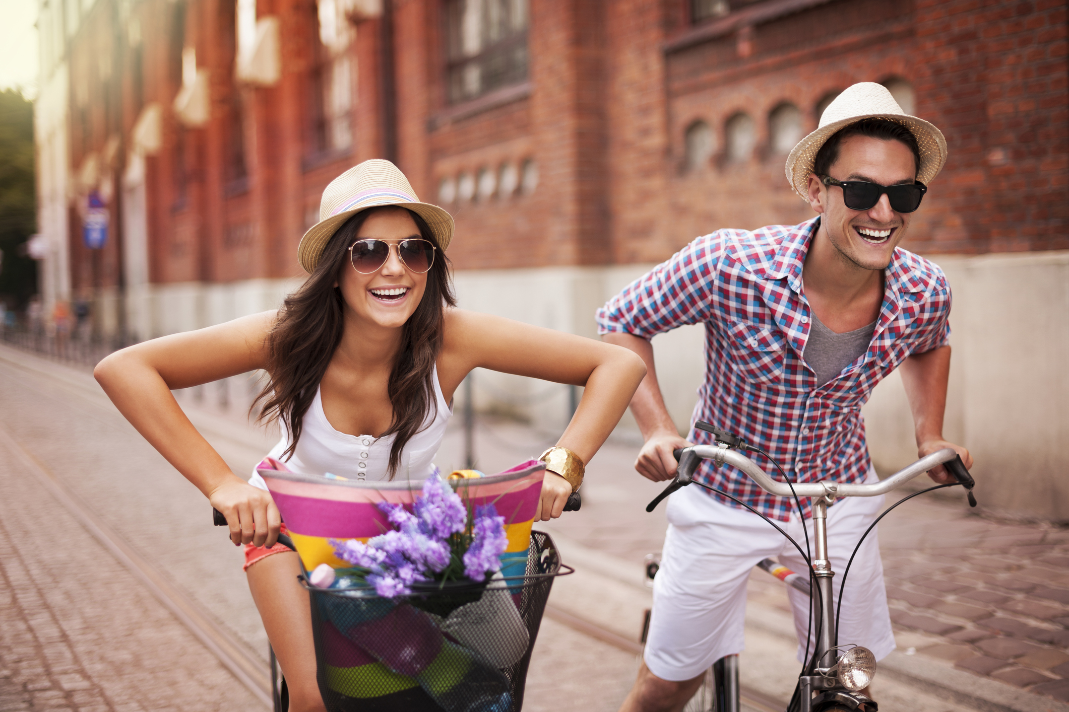 Couple riding bikes on vacation
