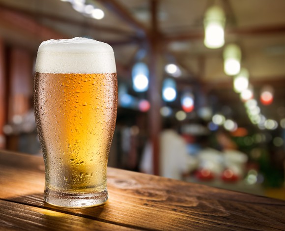 A full glass of beer.