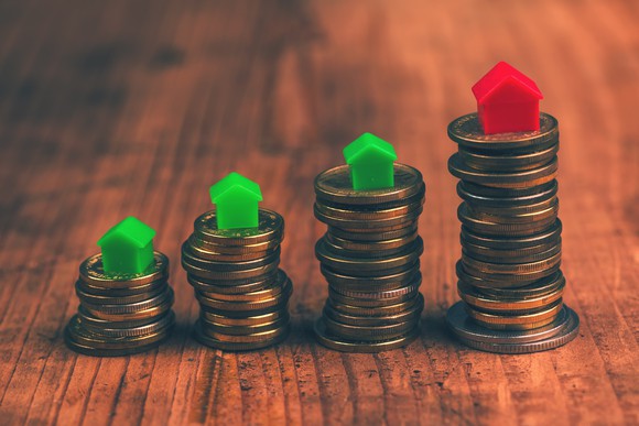 Houses and hotel on penny piles.
