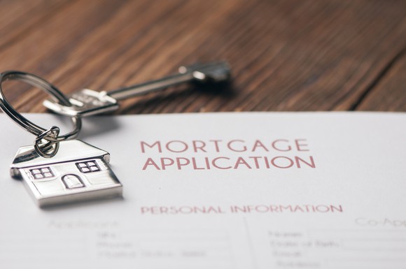 Mortgage application with key.