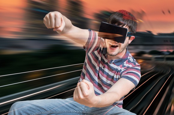 A man uses a virtual-reality headset.