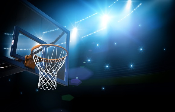 Basketball hoop in arena.