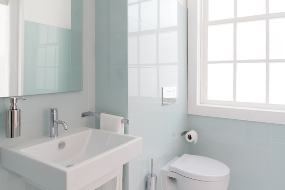 A bathroom showing a sink and toilet
