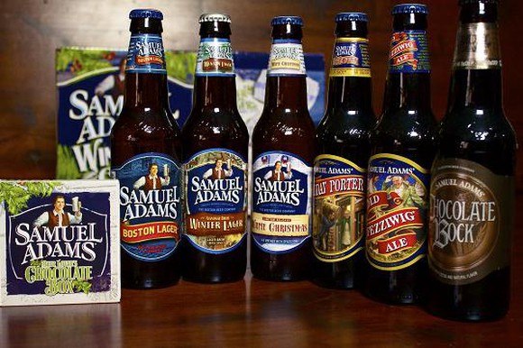 A picture of six bottles of Sam Adams beer.