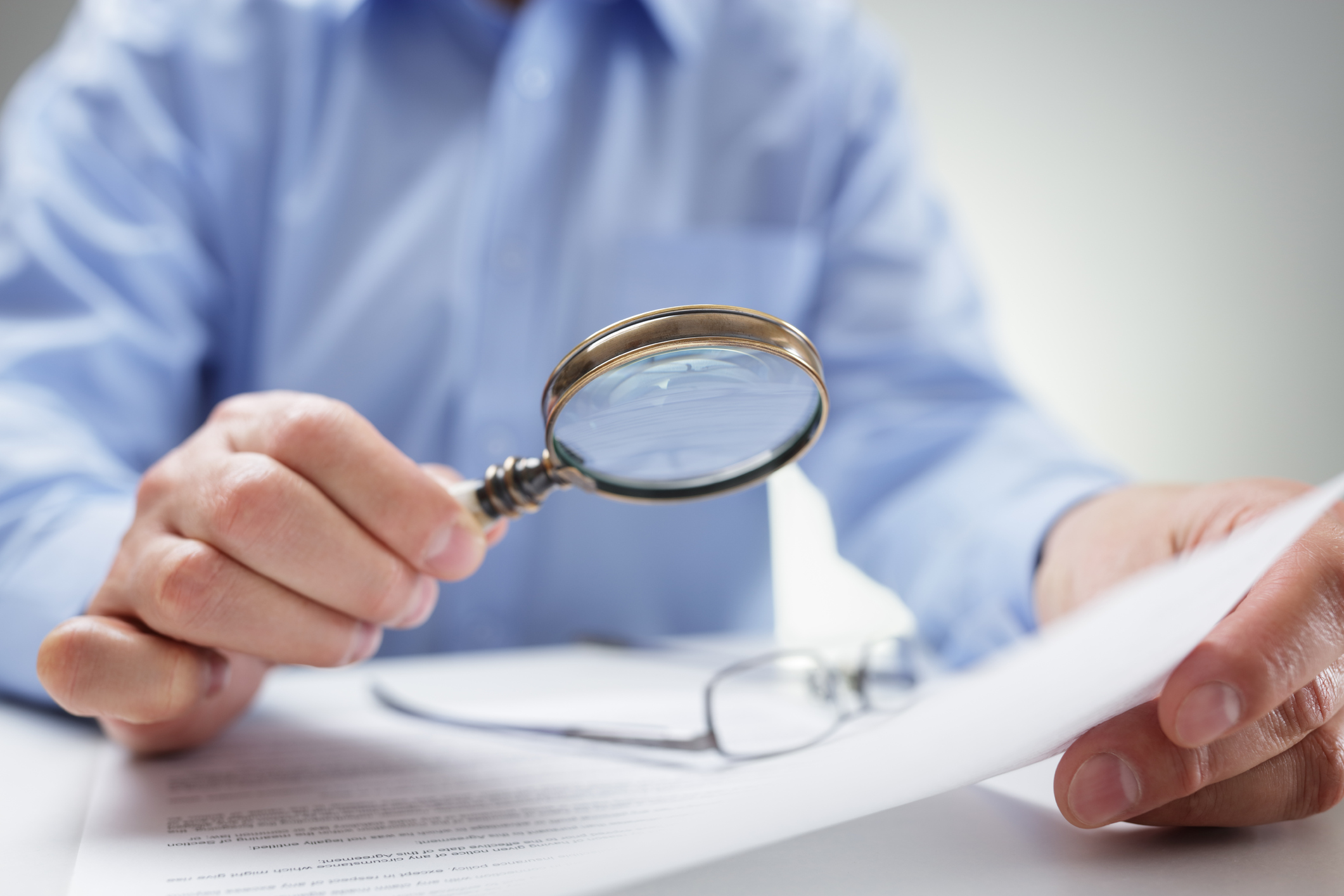 Man with magnifying glass
