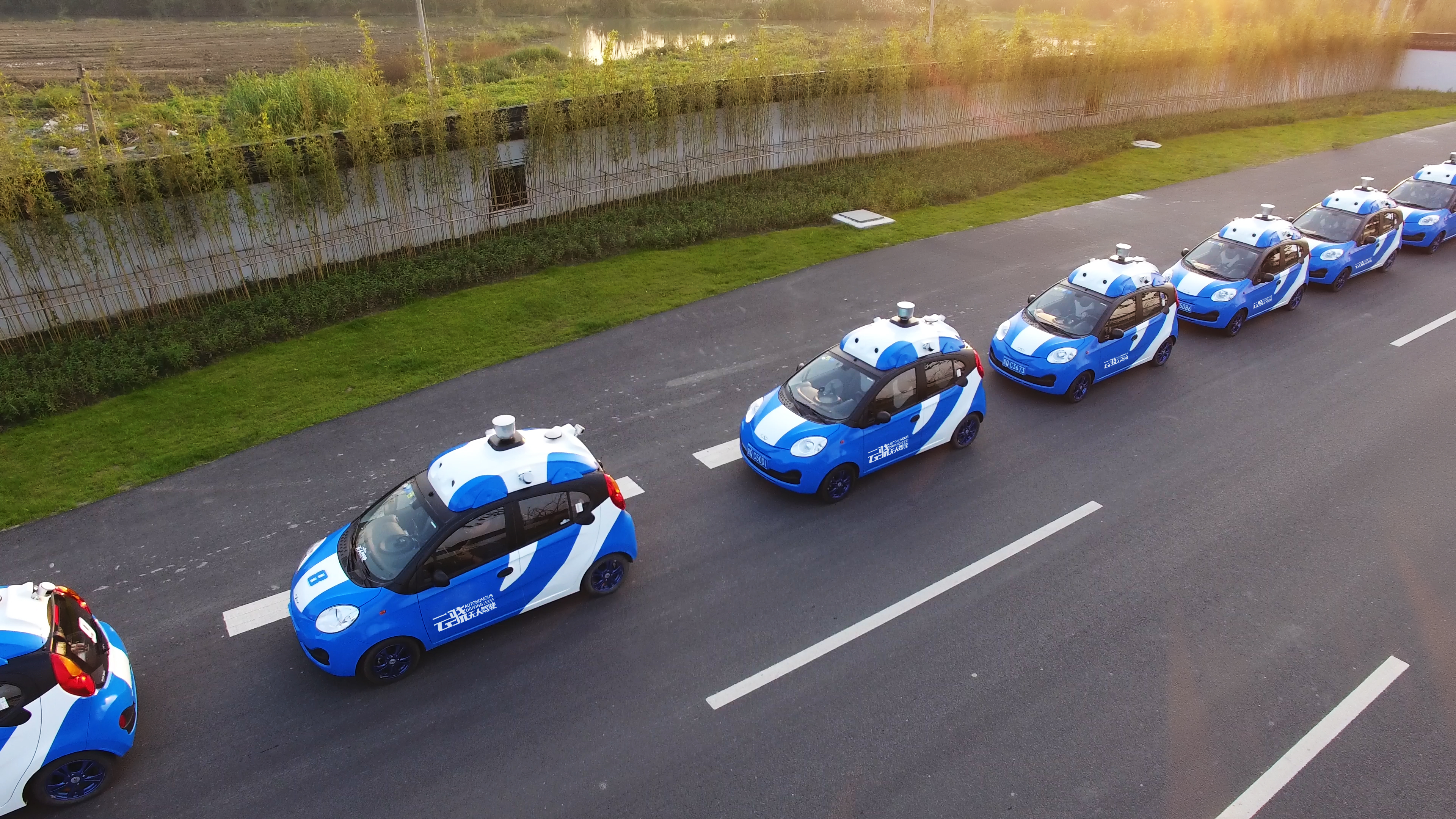 Line of cars equipped with Baidu self-driving hardware.