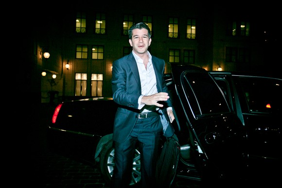 Uber CEO Travis Kalanick exiting a black car.