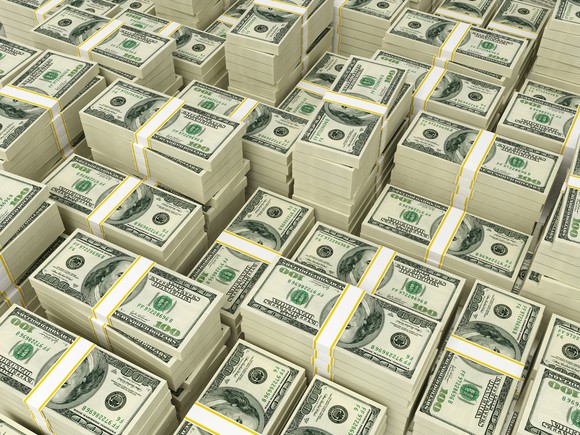 Piles of stacks of 100 dollar bills.