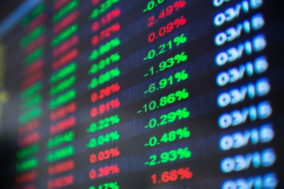 A stock market quotation board.