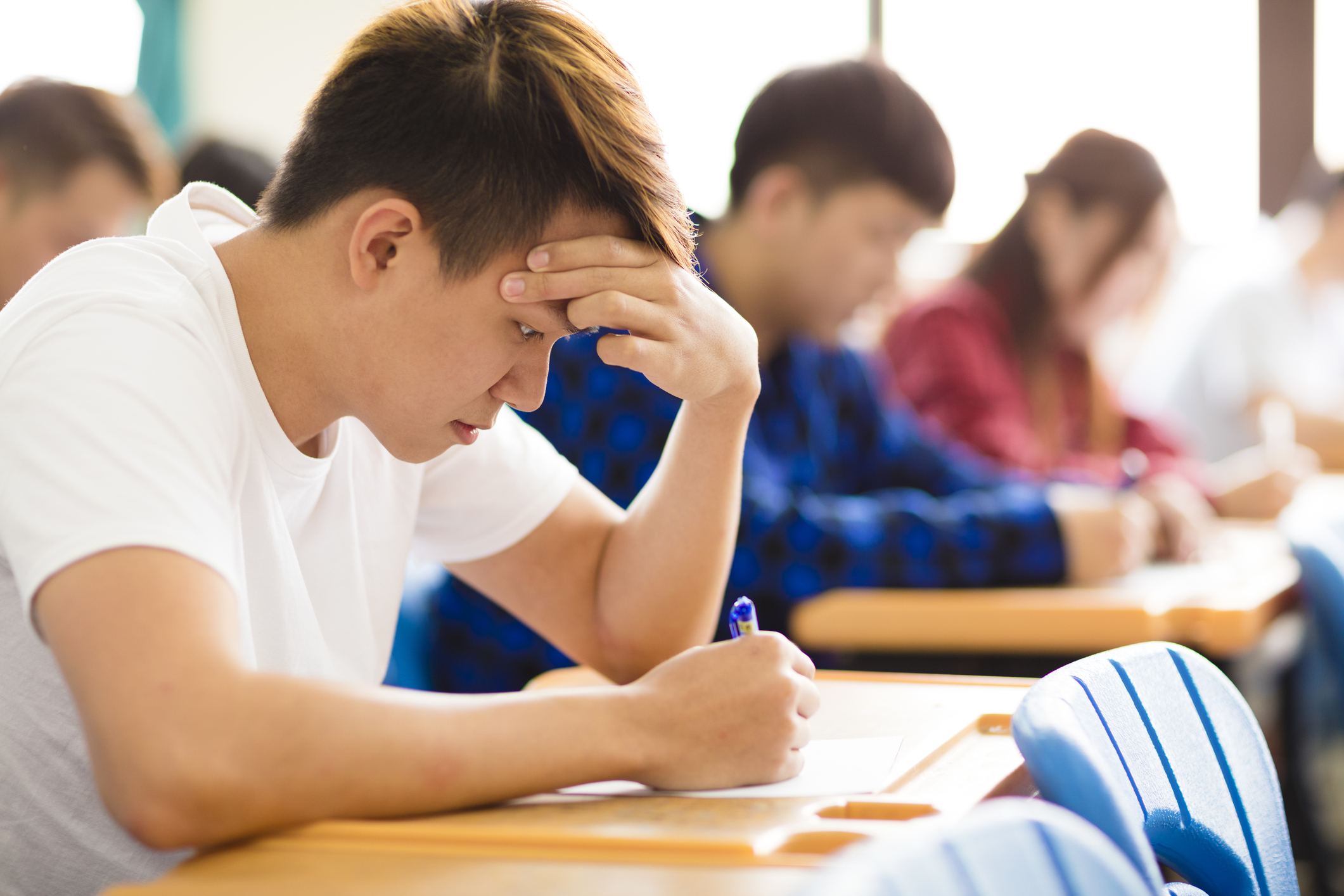 A student taking a test.