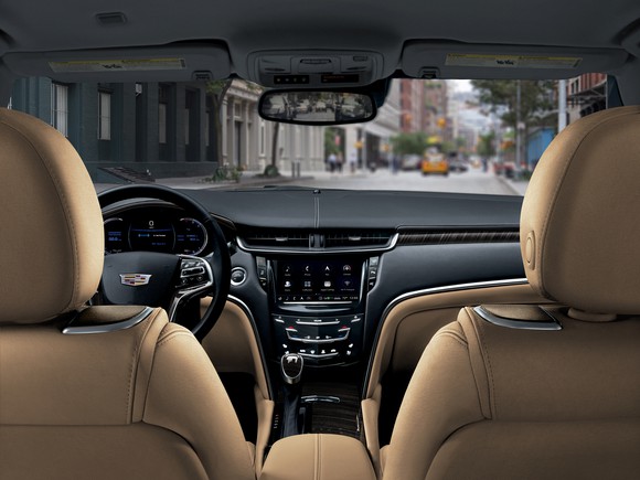 The 2018 Cadillac XTS's dash, viewed from the rear seat
