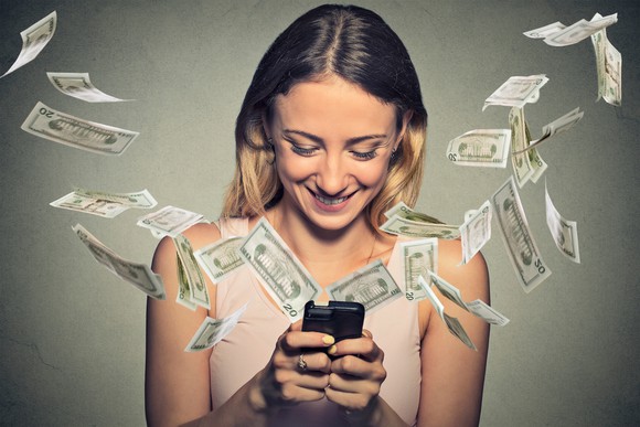 Smartphone and money flying