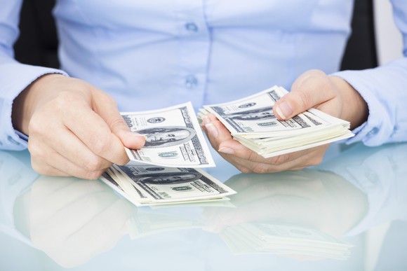woman counting money