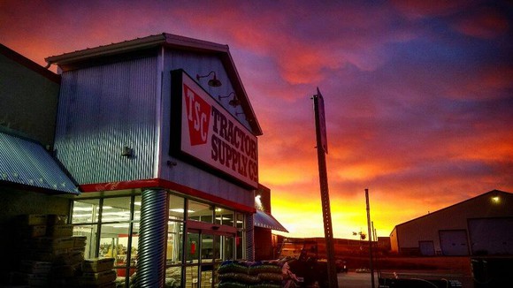 Tractor Supply storefront at sunset.