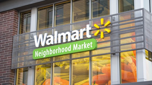 The sign on the front of a Wal-Mart Neighborhood Market