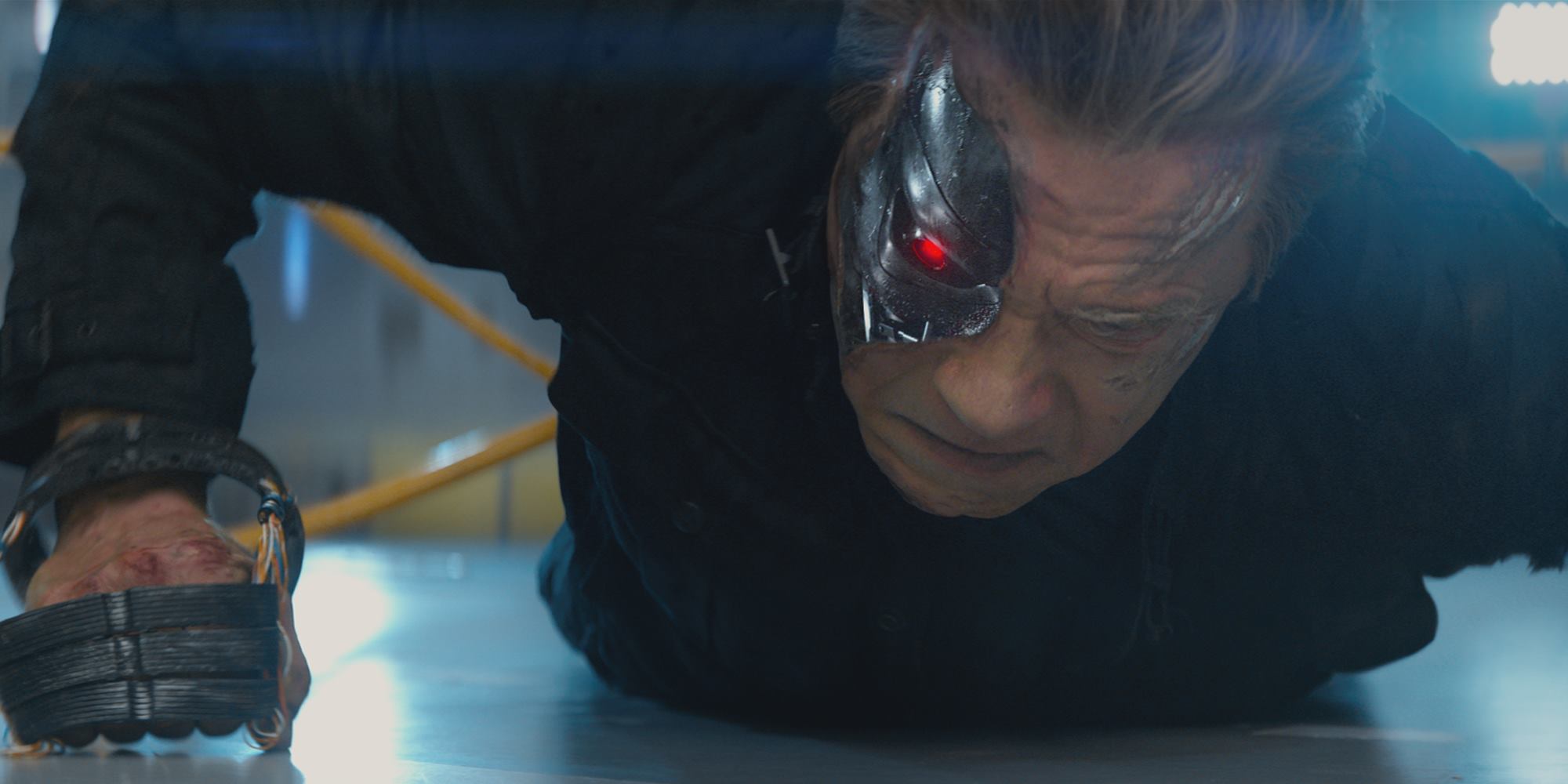 Arnold Schwarzenegger as the Terminator getting back up.