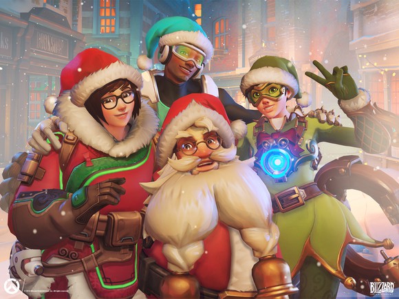 Four Overwatch characters posing in Santa Claus and elf outfits in a winter wonderland theme.