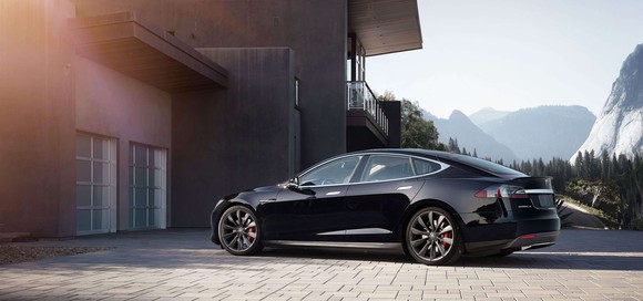 Model S sitting in a driveway on a sunny day.