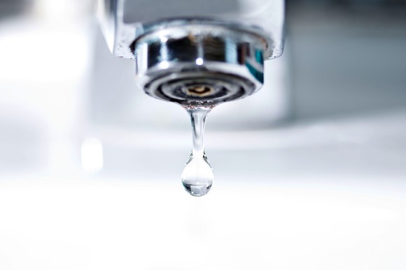 Water dripping from a tap.
