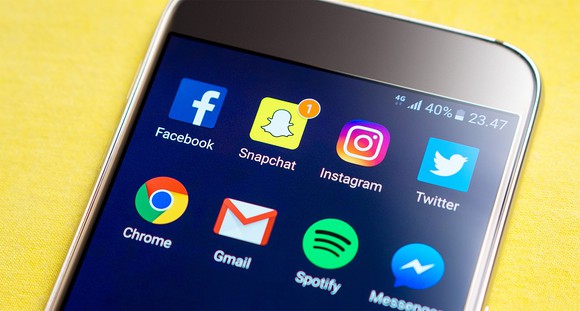 Social media app icons on a smartphone