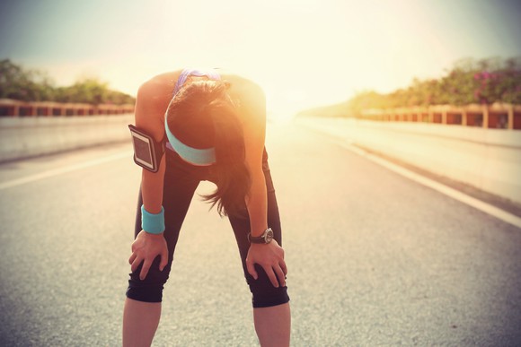 A runner rests after running.