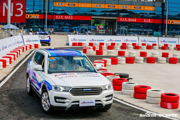 A self-driving car works its way around a track.