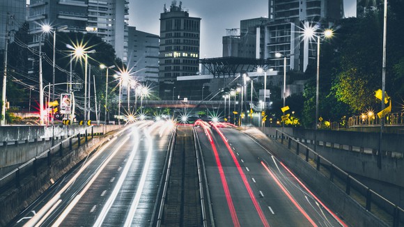 Blurred image of city streets at night.