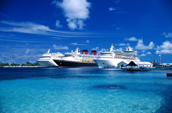 Three cruise ships lined up in port at New Providence, Bahamas.