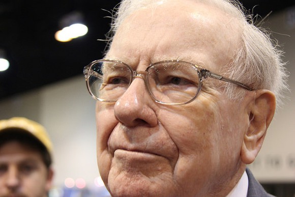 Warren Buffett responding to reporters' questions. 