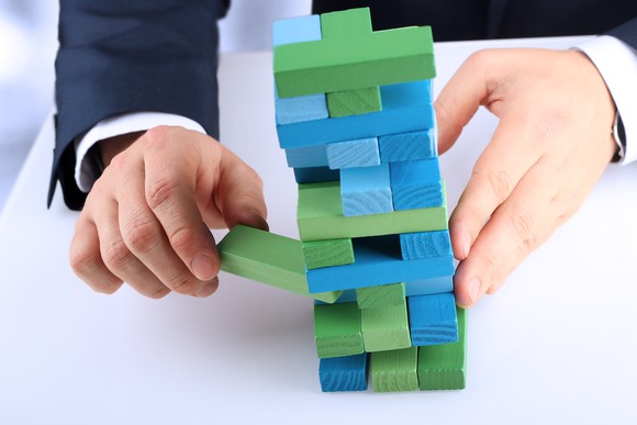Wooden block tower about to collapse