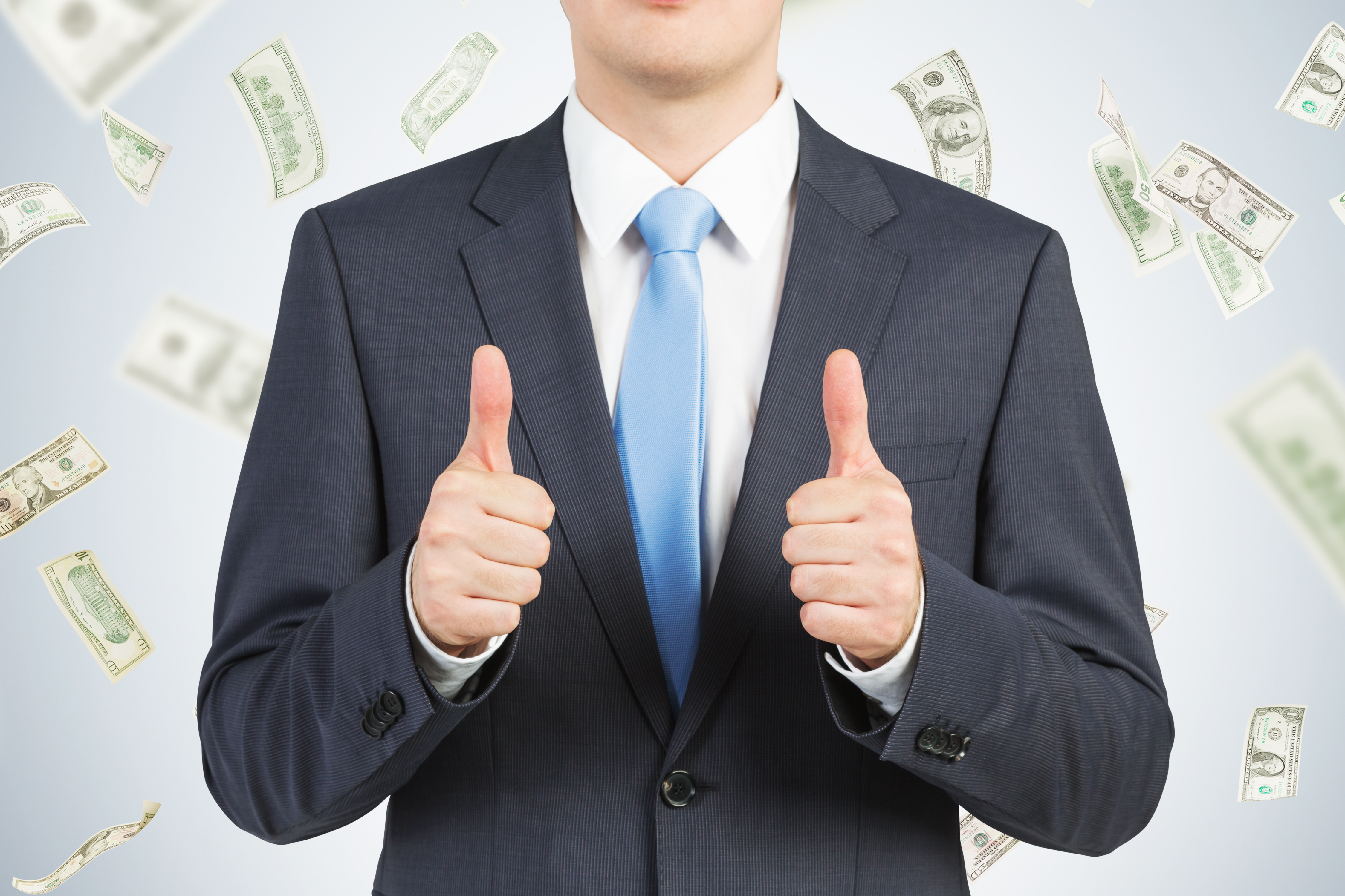 businessman giving thumbs up