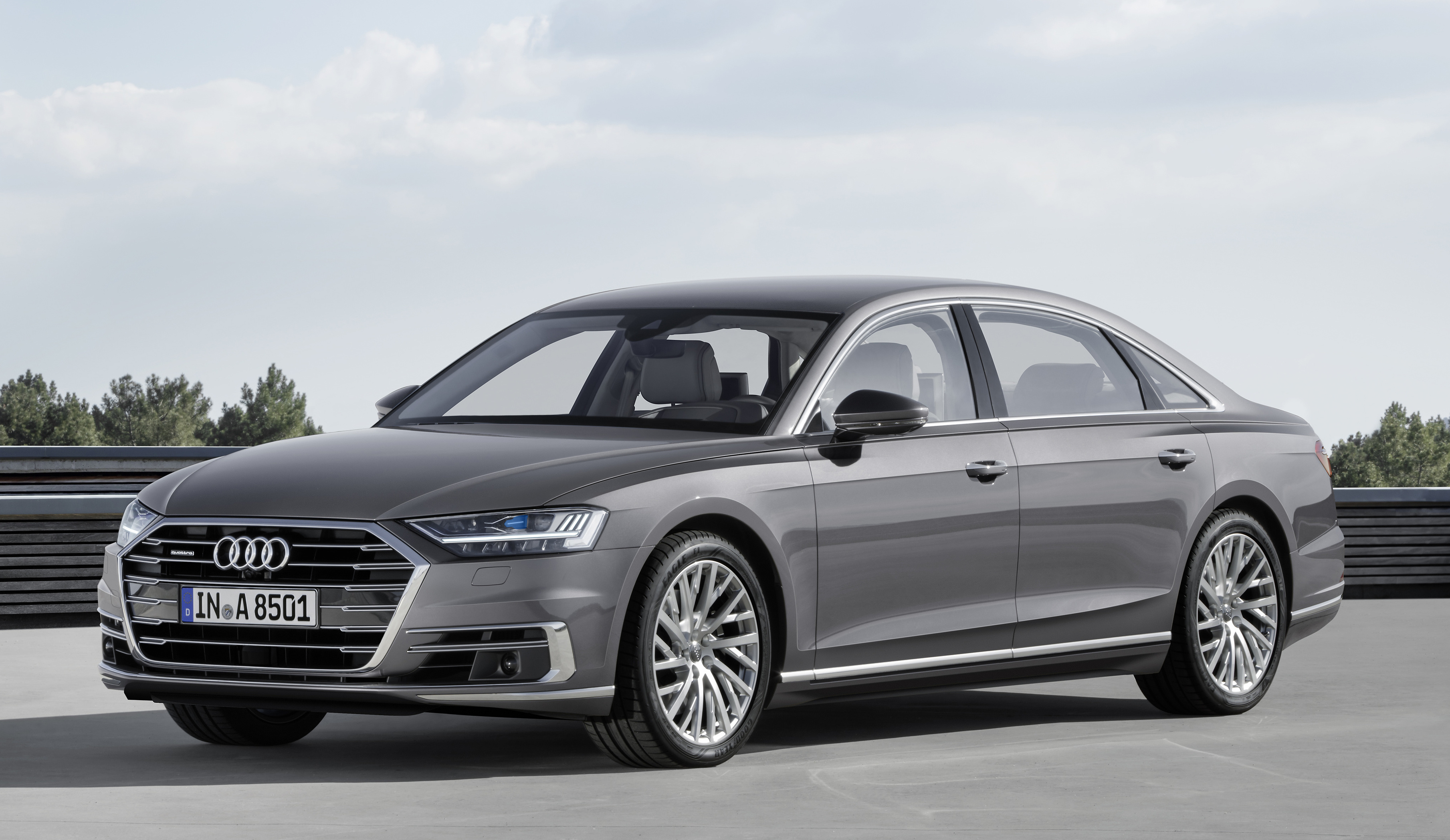 A 2018 Audi A8 sedan in silver.