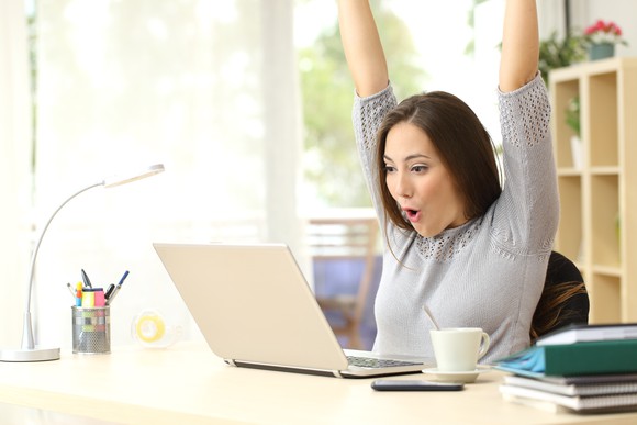 Woman winning online auction