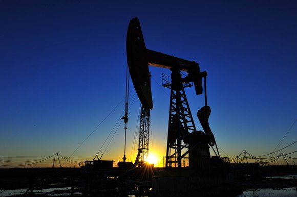 An oil pump at sunrise.