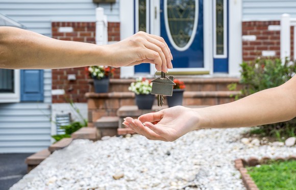 Handing over house key