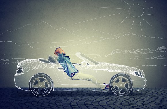 Man relaxing in a driverless vehicle