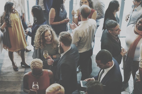 People mingle at a busines event
