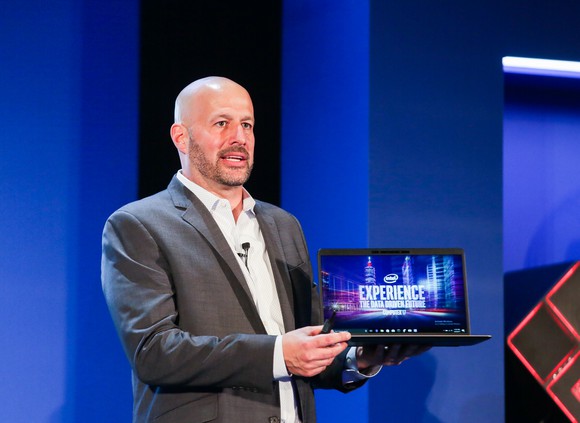 Intel client computing group general manager, Gregory Bryant, demonstrating a PC with an eighth-gen Core chip.