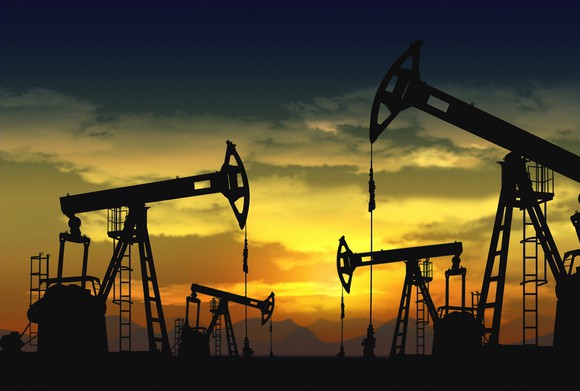 Pumpjacks recovering oil at sunset.