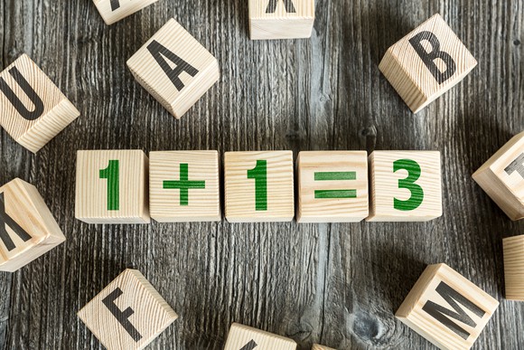 Blocks show the calculation one plus one equals three.