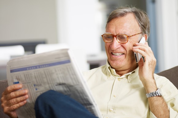 Senior man reading the newspaper