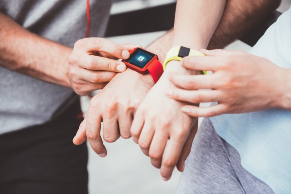 People using wearable devices